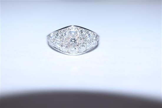 A white metal and diamond cluster set elliptical shaped ring, size H/I.